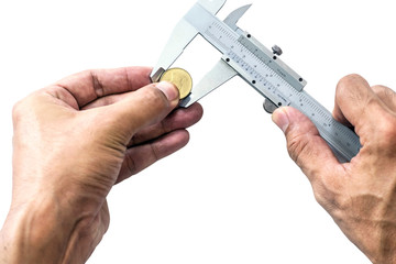 Closeup a man's hand is using Vernier to measure the size of a coin isolated on white background.