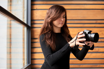 Woman taking a photo. world photographer day concept