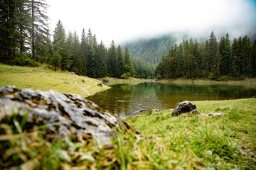 grüner See - green lake Austria with view and clear green water