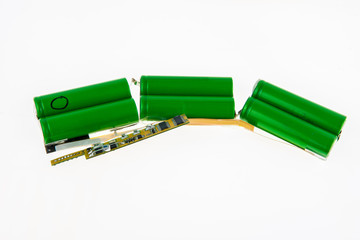 Disassembled laptop battery with charging and protective circuit.