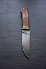 Hunting knife with a beautiful wooden handle