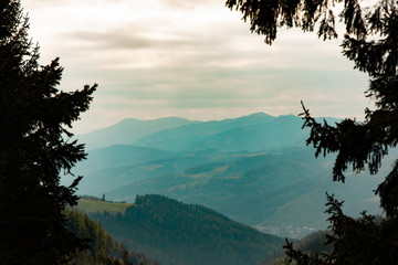 mountain view landscape with trees in foreground framing the view