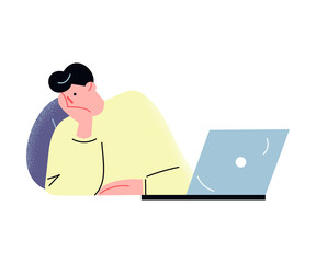 Young man feeling tired of doing computer work in office