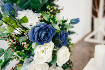 bouquet of white roses on blue background