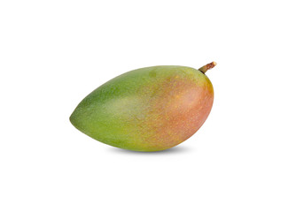 whole raw mango with stem on white background