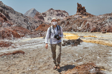 Traveller in medical individual mask in Iran.