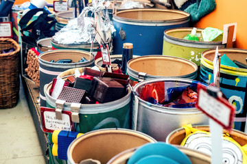 Big barrels with different recycling materials in a shop. Zero wasre concept.