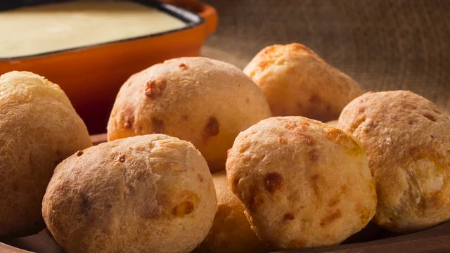 Slide shot Cheese bread. Traditional brazilian food with smoke.