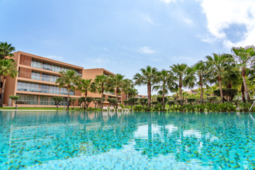 Modern luxurious pool with clean, clear, blue water on site.