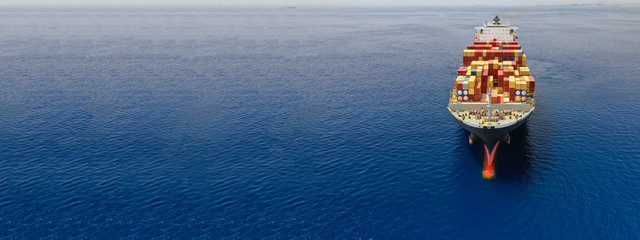 Aerial drone panoramic photo of industrial container tanker cruising in open ocean deep blue sea	
 - obrazy, fototapety, plakaty