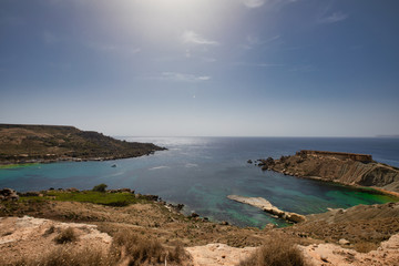 Fototapeta na wymiar Ghajn Tuffieha, Malta . The beautiful Gnejna Bay. Qarraba bay at Malta. beautiful landscape and view at sea. Scenery island