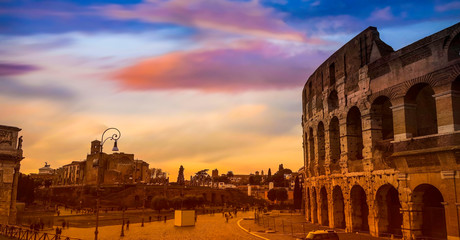 Landmark View of Colosseum in  Europe Rome,Italy,which Rome ancient arena of gladiator fights,sunset sky scene