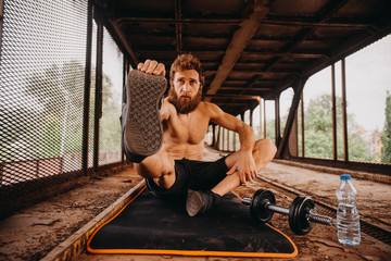 Man working out at old train station
