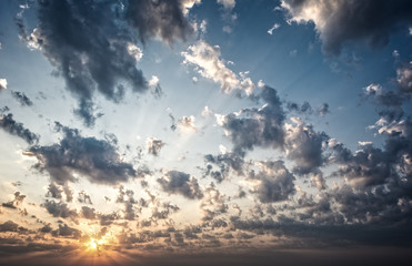 Dramatic sunrise with clouds and rays of light from the sun