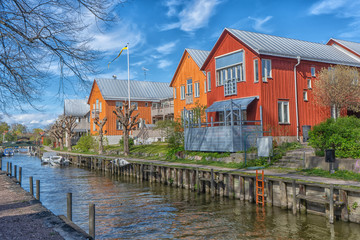 Fototapeta na wymiar A small town Trosa. View with canal. Swedish countryside.