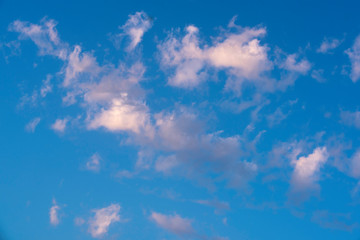 Naklejka na ściany i meble white clouds spread on blue sky