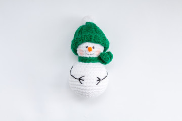 knitted snowman on a white background