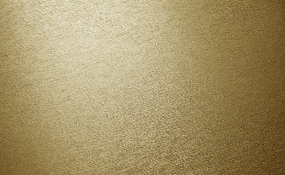 Metallic gold gradient background with thin scratches