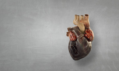 Image of human heart made of metal elements