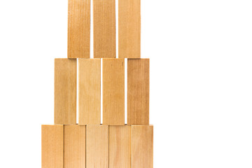 Row of wooden block tower game children isolated on white background
