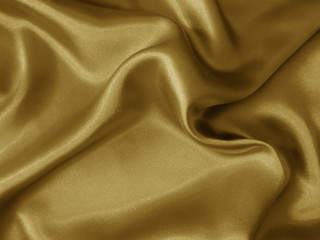 Shiny gold crumpled fabric background.