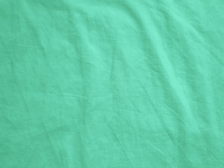 Mint crumpled fabric texture background