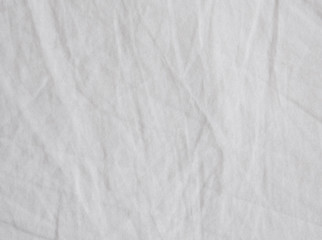 Plakat White crumpled fabric texture background