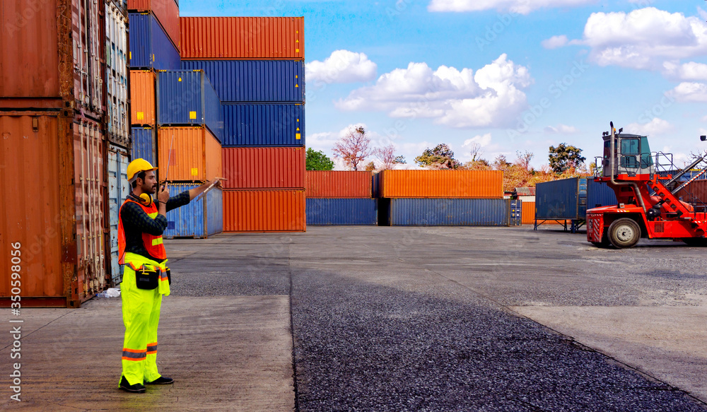 Poster foreman is controlling container loading in import-export business.