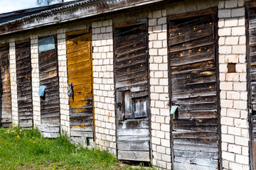 old shed with wooden doors in the village