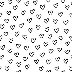 seamless pattern with hand drawn doodle hearts