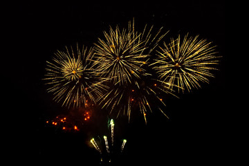 Beautiful golden firework isolated on black background