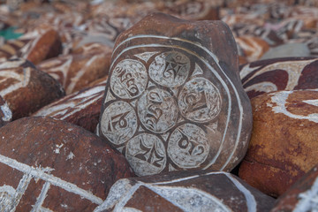 Mani stone with engraved Buddhist mantras