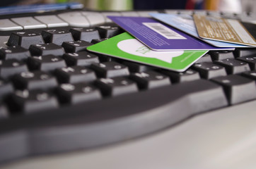 Credit card on the keyboard. Trade and business on the Internet. Earnings and finance.