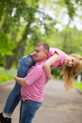 beautiful couple walks in the park