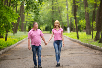 beautiful couple walks in the park