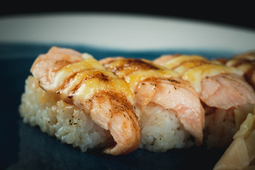 Burn salmon sushi. Selective focus