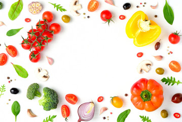 Cook frame with fresh vegetables, herbs and spices on white background. Organic raw salad and pizza ingredients. Flat lay, copyspace, top view.