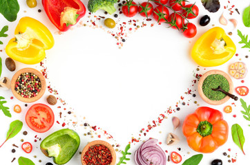 Cooking background with fresh vegetables, herbs and spices on a white kitchen table. Organic raw salad and pizza ingredients. Flat lay, copyspace, top view.