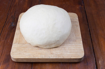 flour and dough on the board
