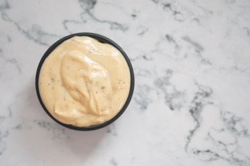 Bowl of cream dressing sauce