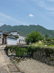 Fototapeta na wymiar Hui-style buildings, Hui-style villages, and green creepersQuiet mountain village, with ancient buildings with a long history, small bridges and flowing water, very suitable for living