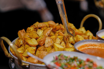 Baked Potato Wedges seasoned with salt, oil and spices