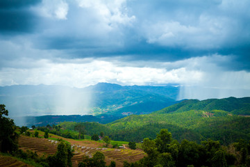 Beautiful landscape view of rice terraces and cottages in the rainy season and mountain in the background,Pa bong Pieng,Mae Jam, ChiangMai,Thailand
