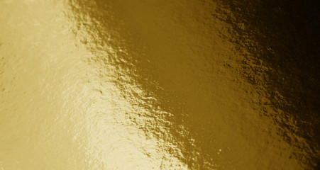 Obraz premium Gold foil texture background with uneven surface