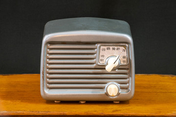 Vintage 40's radio tube receiver in a metal cabinet