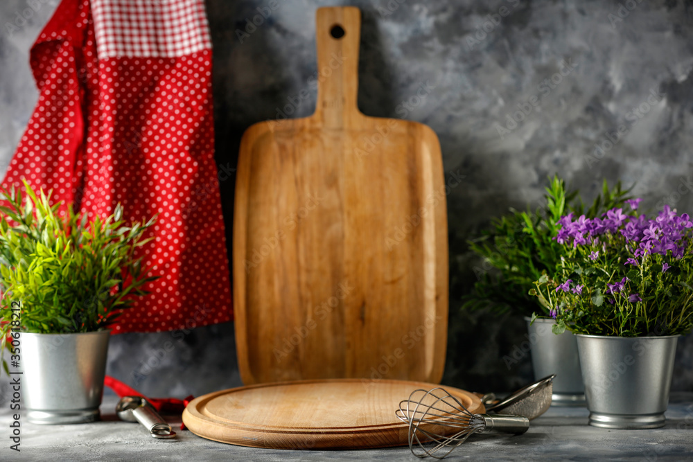 Poster kitchen table with cooking tools and fresh vegetables