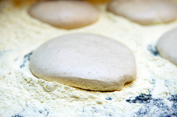 Fototapeta na wymiar leavened bread dough ready to be transformed into pizza