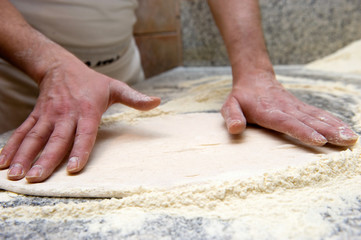 pizza margherita preparing in italy