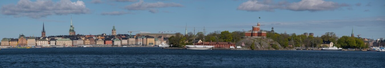 View over the old town district Gamla Stan and the islands Djurg&aring;rden and Kastellholmen in Stockholm a sunny spring day