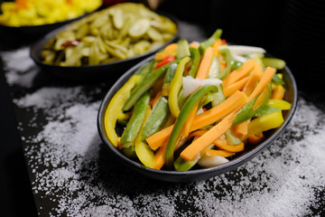 Various kinds of salads on a table. Vegetarian food